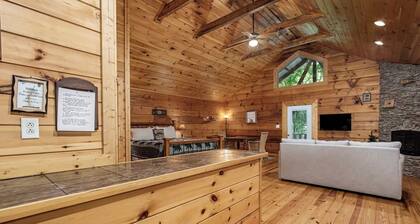 Angler cabin. This modern private studio Cabin with HOT TUB is tucked away in a wooded cove.