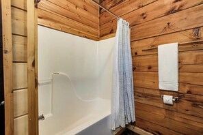 Bathtub, hair dryer, towels