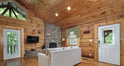 Angler cabin. This modern private studio Cabin with HOT TUB is tucked away in a wooded cove.
