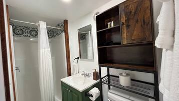 Shower, towels, soap, shampoo