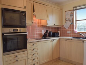 Dishwasher, high chair, cookware/dishes/utensils