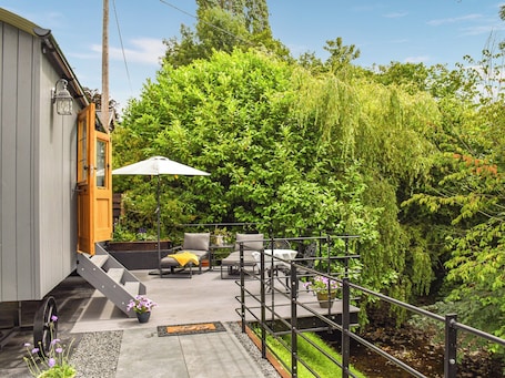 Terrace/patio. A perfectly formed shepherds hut, that puts the glam in glamping.