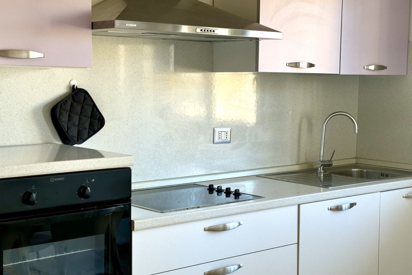 Fridge, oven, dishwasher, dining tables