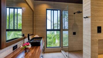 Shower, eco-friendly toiletries, hair dryer, towels