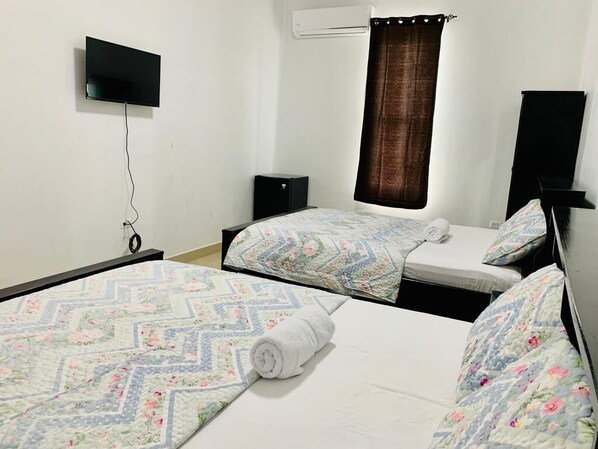 Family Room | Soundproofing, iron/ironing board, free WiFi - Coastal Bay2 Hotel (San Pedro)