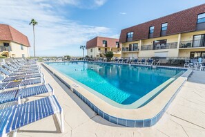 A heated pool - Sun-Kissed Escape: Steps to Pier w/ Heated Pool & Private Balcony (Cocoa Beach)