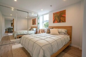 1 bedroom, desk, iron/ironing board, travel cot