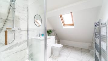 Bathtub, hair dryer, shampoo