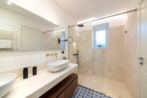 Hair dryer, towels, soap, shampoo