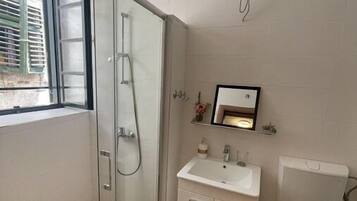 Hair dryer, bidet, towels, soap