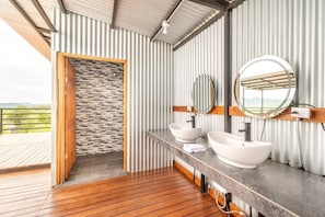 Bungalow | Bathroom | Shower, designer toiletries, hair dryer, towels