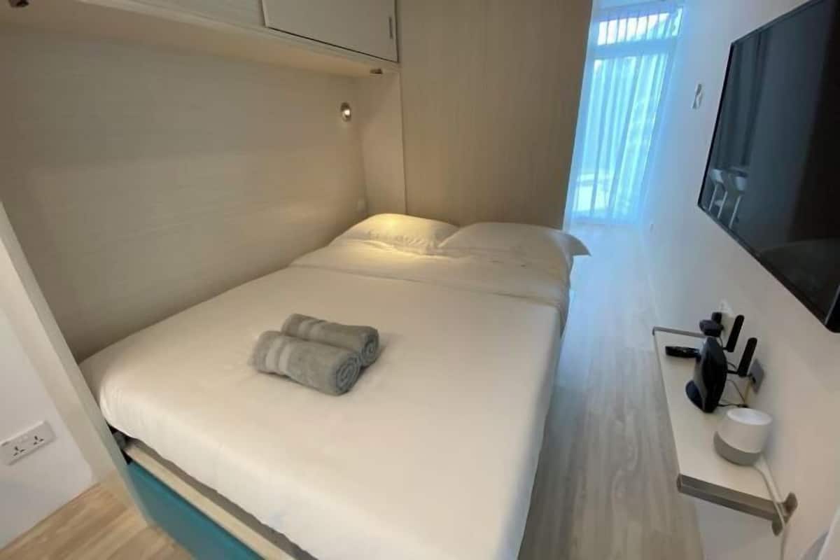 1 bedroom, desk, blackout drapes, iron/ironing board