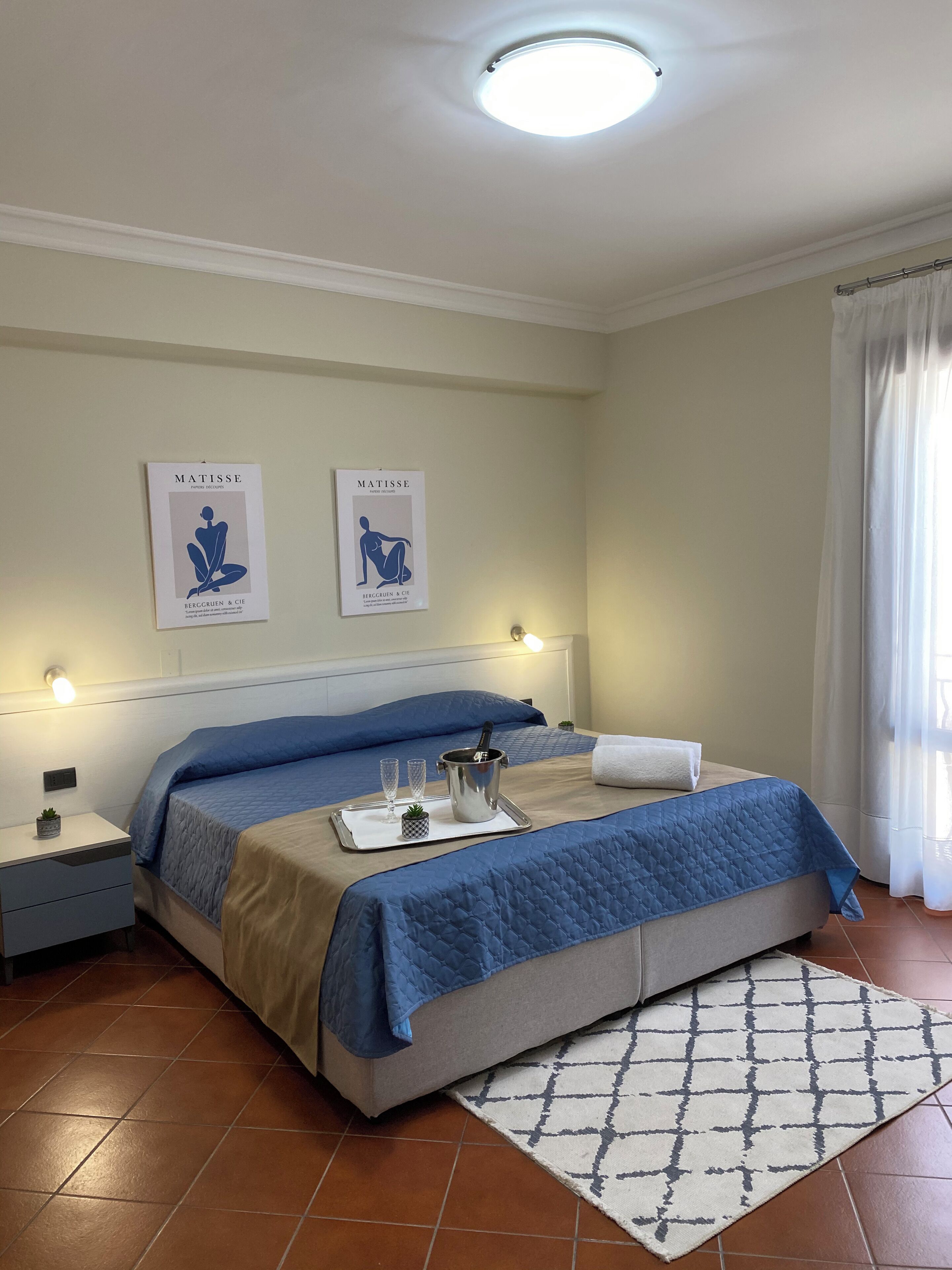 Deluxe Suite, 1 Queen Bed | Minibar, desk, blackout drapes, free WiFi