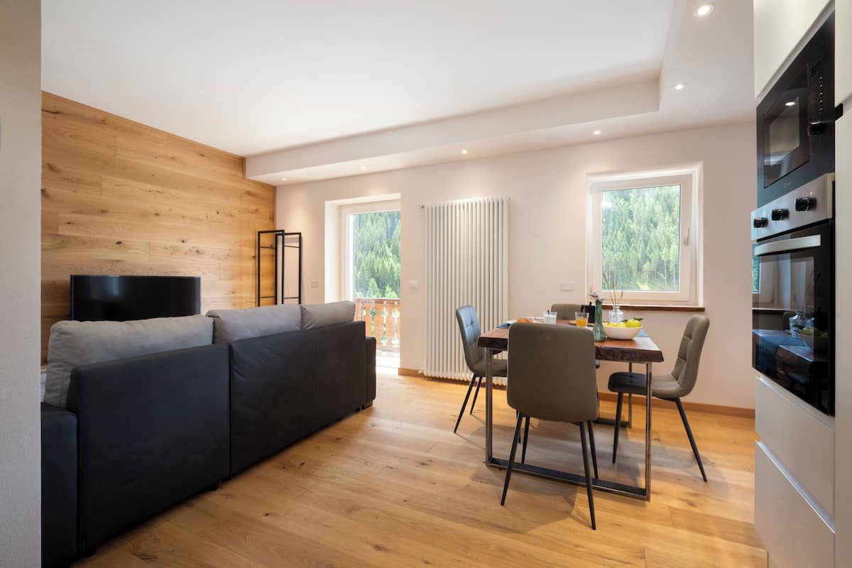 Luxury Apartment | Living area | 50-inch Smart TV with digital channels, streaming services