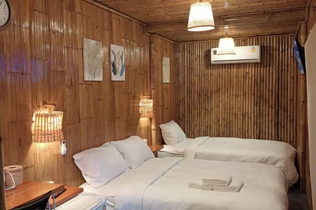 Down duvets, Select Comfort beds, blackout curtains, free WiFi