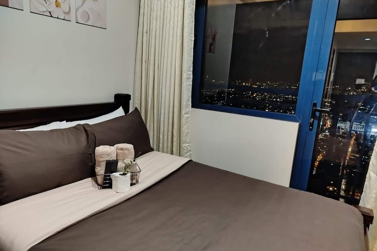Panoramic Condo, Balcony, City View | 1 bedroom, desk, iron/ironing board, free WiFi