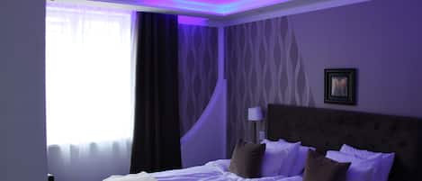 Premium bedding, down duvets, minibar, in-room safe