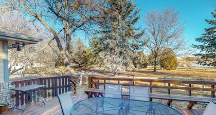 Lake-view home with gas fireplaces, inviting deck & dog-friendly yard