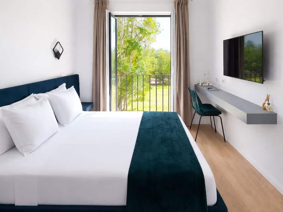 Hypo-allergenic bedding, pillow-top beds, in-room safe, desk