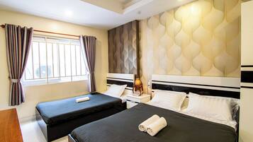 Kamar Triple Deluks | Wi-Fi gratis dan seprai linen