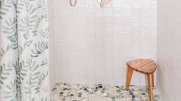 Shower, eco-friendly toiletries, hair dryer, towels
