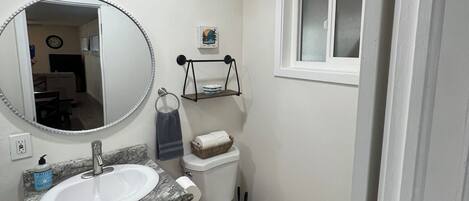 Hair dryer, towels, soap, shampoo