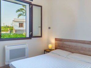 4 bedrooms, iron/ironing board, travel cot, WiFi