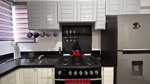Fridge, microwave, oven, stovetop
