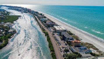 On the beach, sun-loungers, beach towels