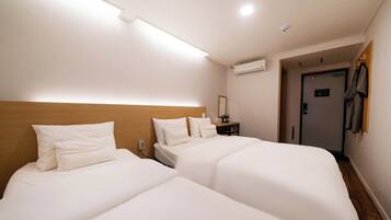 Habitación estándar con 2 camas individuales | Wifi gratis y ropa de cama