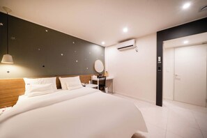 Habitación Deluxe | 1 habitación, wifi gratis y ropa de cama