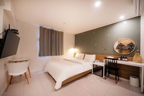 Habitación Deluxe | 1 habitación, wifi gratis y ropa de cama