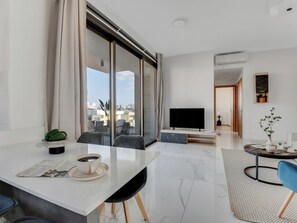 Apartment, 2 Bedrooms, Balcony, City View | Living room