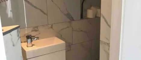 Hair dryer, towels, soap, shampoo