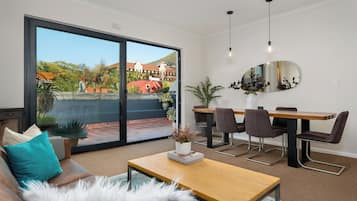 Grand Apartment | Living area | Flat-screen TV, Netflix, streaming services