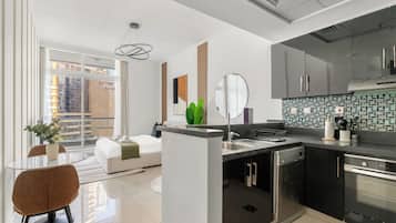 Junior Studio | Private kitchen | Fridge, microwave, oven, stovetop