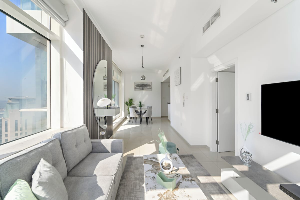 Deluxe Apartment | Living area | 50-inch Smart TV with digital channels