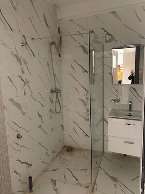 Shower, bidet, soap, shampoo