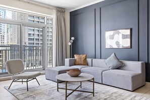 Burj Views B L242 | Living area | 50-inch flat-screen TV with cable channels - Silkhaus Burj Views, Downtown Dubai (Dubai)