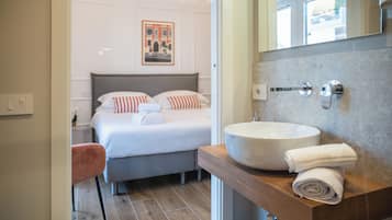 Deluxe Room | Bathroom | Shower, rainfall showerhead, hair dryer, dressing gowns