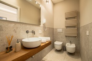 Bathroom | Shower, rainfall showerhead, hair dryer, bathrobes