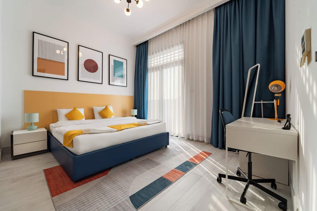 Apartemen, 1 kamar tidur, balkon | Area keluarga | TV layar datar, foosball, meja tenis meja, dan buku