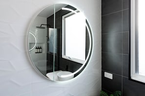 Shower, hair dryer, towels
