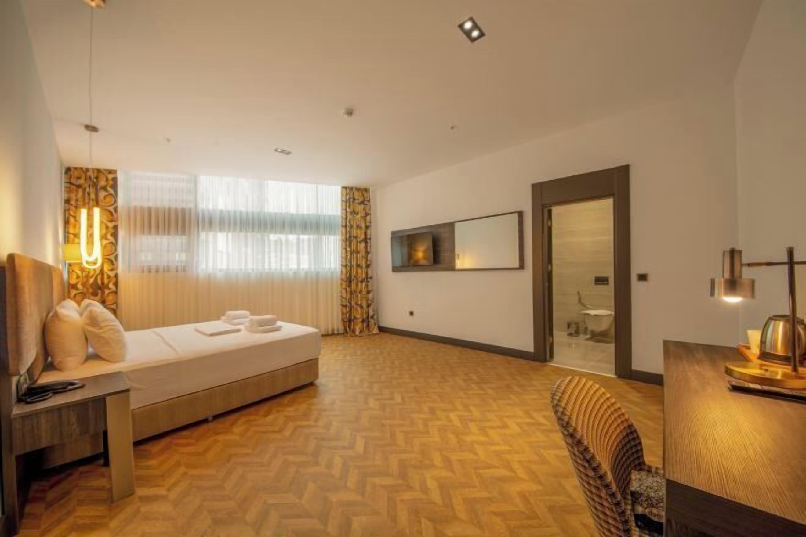 Premium bedding, minibar, in-room safe, laptop workspace