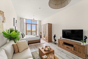 Classic Studio | Living area | 50-inch Smart TV with digital channels