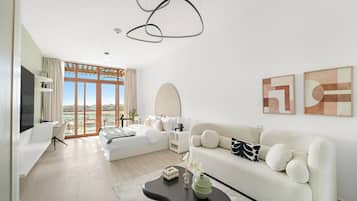 Panoramic Studio | Living area | 50-inch Smart TV with digital channels