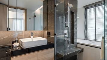 One Bed Room with Bathtub | Bathroom | Separate tub and shower, rainfall showerhead, free toiletries