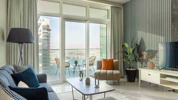 Classic Apartment | Living area | 43-inch flat-screen TV with cable channels