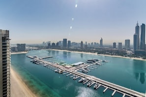 Located adjacent to a well-organized marina with multiple docks and boats.