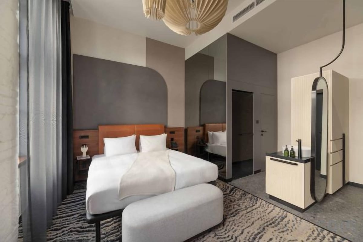 Premium bedding, memory-foam beds, minibar, in-room safe